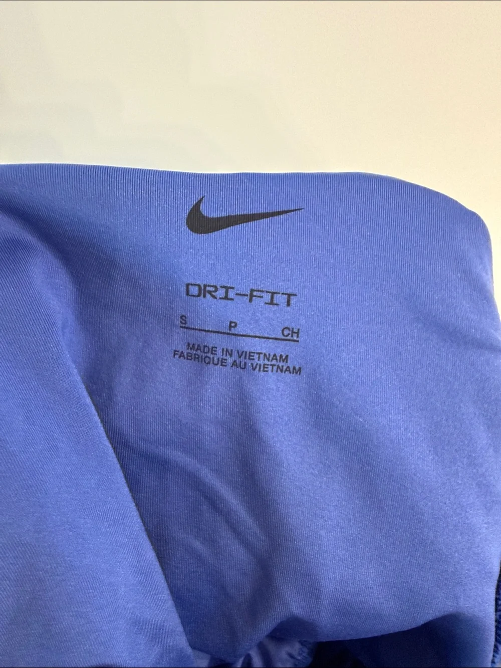 Nike Women’s Blue Athletic Running Shorts with White Swoosh